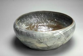 Bowl with incised floral design