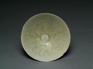 Tea bowl with incised wave pattern design and celadon crackled glaze