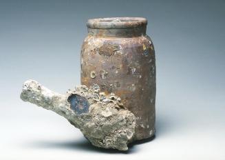 Storage jar with attached concretion from the Hoi An shipwreck