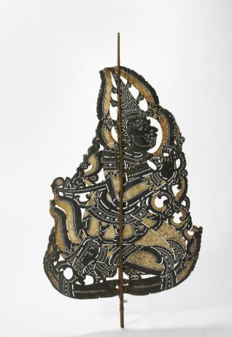 Shadow puppet of a high-ranking demon, probably Indrajit, in a respectful pose, from the Thai version of the epic of Rama