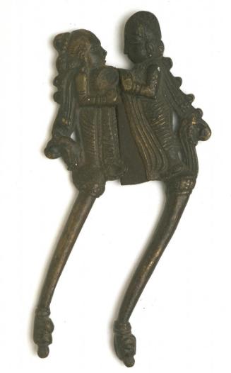 Betel nut cutter in the shape of a man and woman