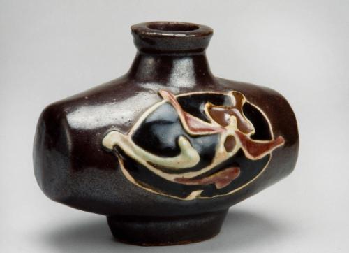 Barrel-shaped bottle with orchid decoration