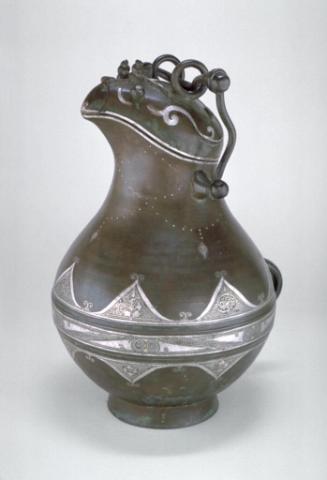 Vessel (he) in the shape of an owl