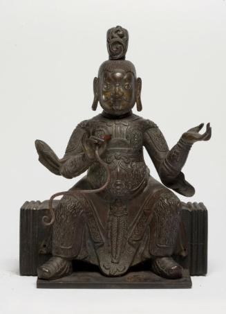 Seated guardian figure