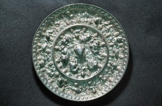 Mirror with mythical beasts amid grapes