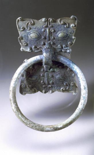 Handle with animal mask, one of a pair