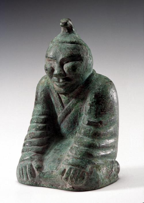 Seated figure, one of four