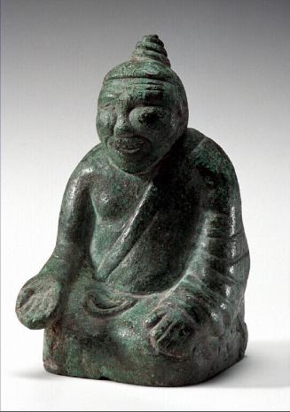 Seated figure, one of four