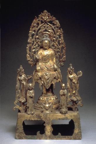 A buddha, probably Amitābha, flanked by bodhisattvas and attendants