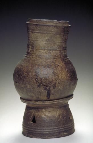 Long-necked jar on pedestal