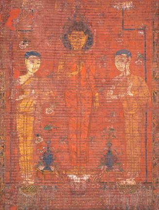 Standing Buddha flanked by two disciples