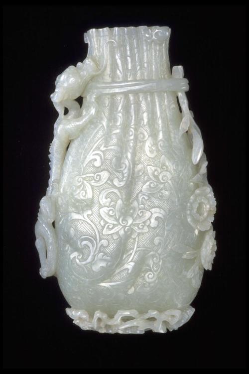 Vase in the shape of a bag with a dragon and flowers