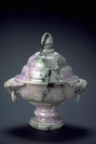 Covered bowl on a pedestal foot