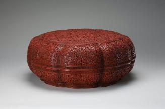 Round lidded box with eight lobes