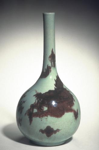 Bottle with design of dragon chasing a flaming pearl