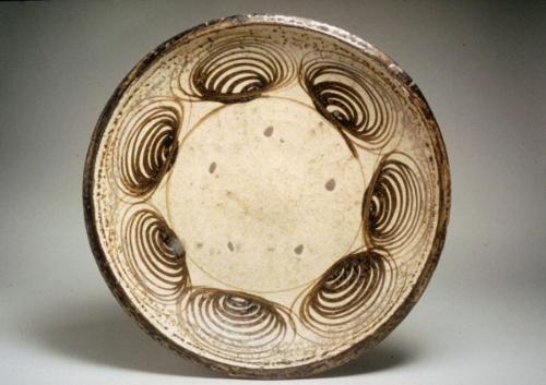 Dish with horse-eye design