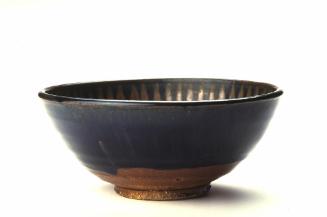 Bowl with two rows of radiating strokes on a black ground