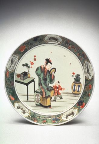 Plate with mother and her son, one of a pair