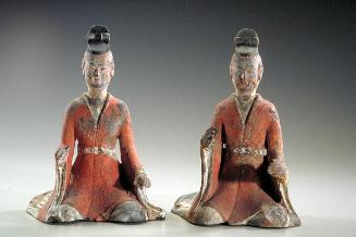 Kneeling figure, one of a pair