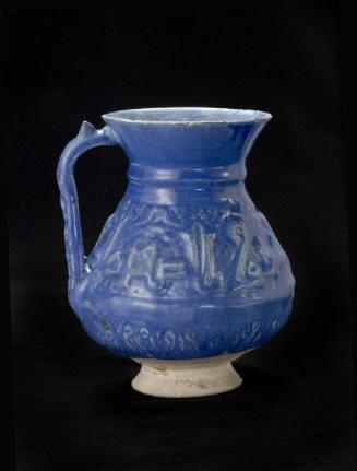 Jug with molded decoration