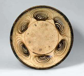 Plate with horse-eye decoration