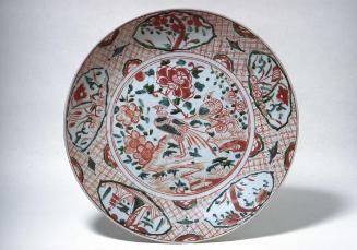 Plate with peacocks in flower garden