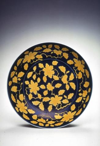 Plate with flower design, one of a pair