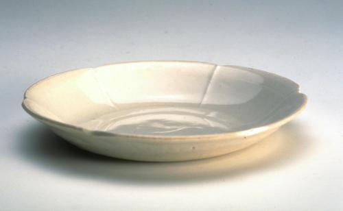 Petal-shaped saucer, one of a pair