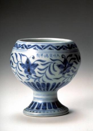 Stemmed bowl with floral scrolls