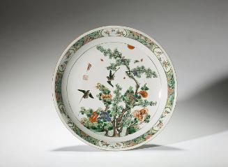 Plate with swallows and apricot blossoms