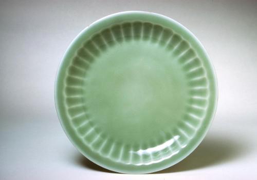 Lobed bodied saucer, one of a pair