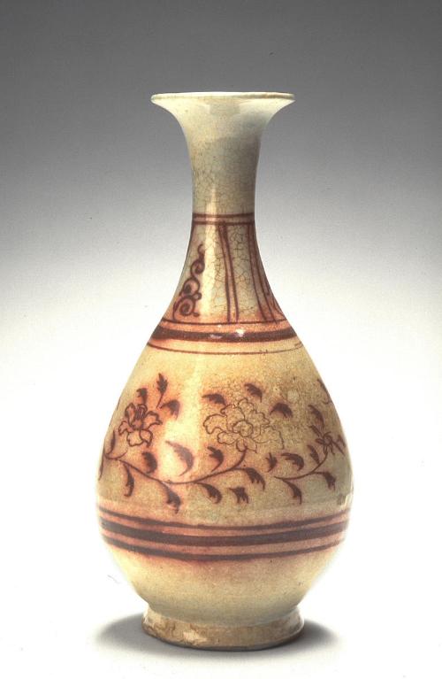 Vase with floral scrolls, one of a pair