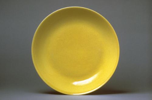 Plate with yellow glaze