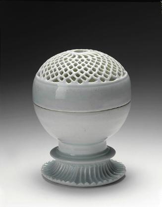 Spherical incense burner with latticed cover