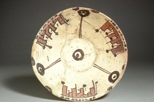 Bowl with abstract decoration and blocks of script