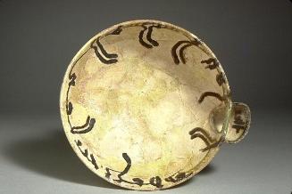 Bowl with stylized inscription