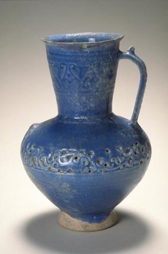 Jug with decoration of foliage scrolls