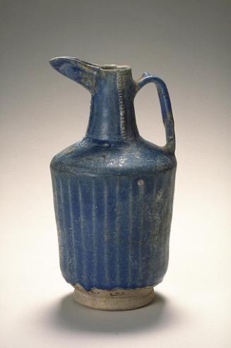 Pitcher with molded decoration