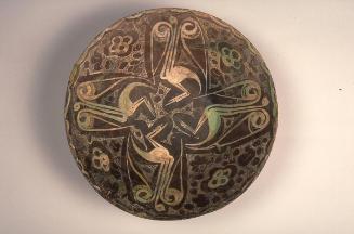 Bowl with four long-necked birds