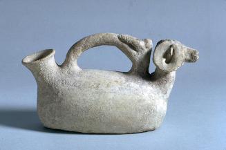 Vessel in the form of a ram, with handle