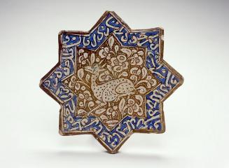 Star-shaped tile with gazelle design