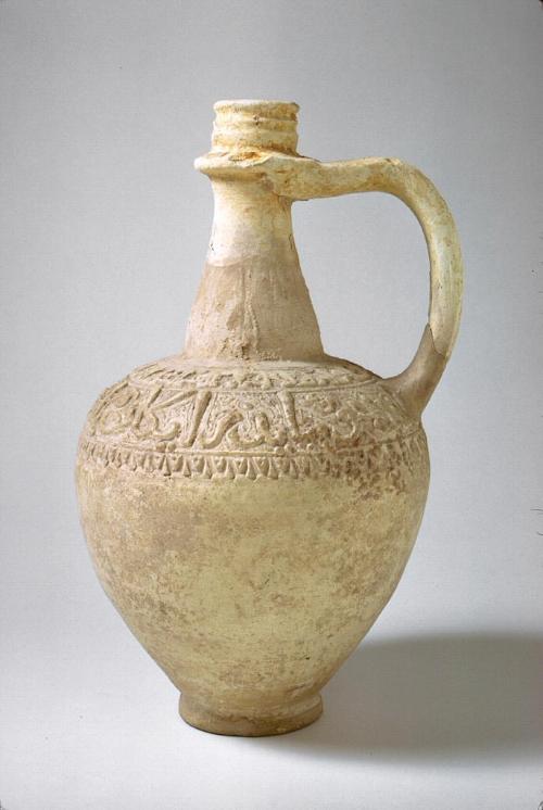 Long-necked jug with molded inscription