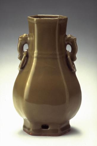 Hexagonal vase with molded animal-head handles