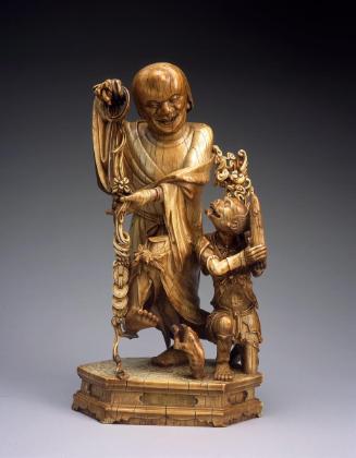 Liu Hai, God of Wealth, baiting his toad