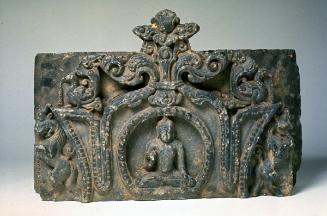 Fragment of a votive stupa with Buddha image