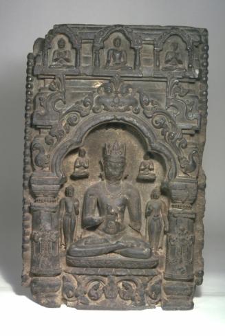 Crowned Buddha in niche, a fragment of a votive stupa