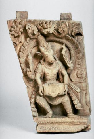 Panel from a ceremonial chariot showing Nandikeshvara playing a drum