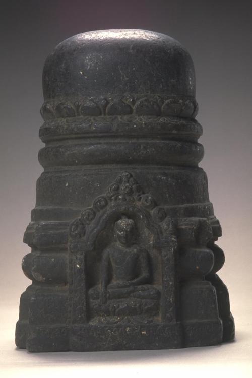 Votive stupa with seated Buddha