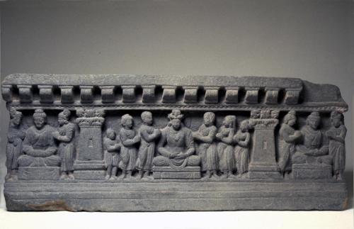 A bodhisattva and Buddhas with worshippers