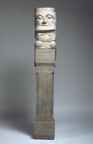 Male tomb figure on pillar, one of a pair